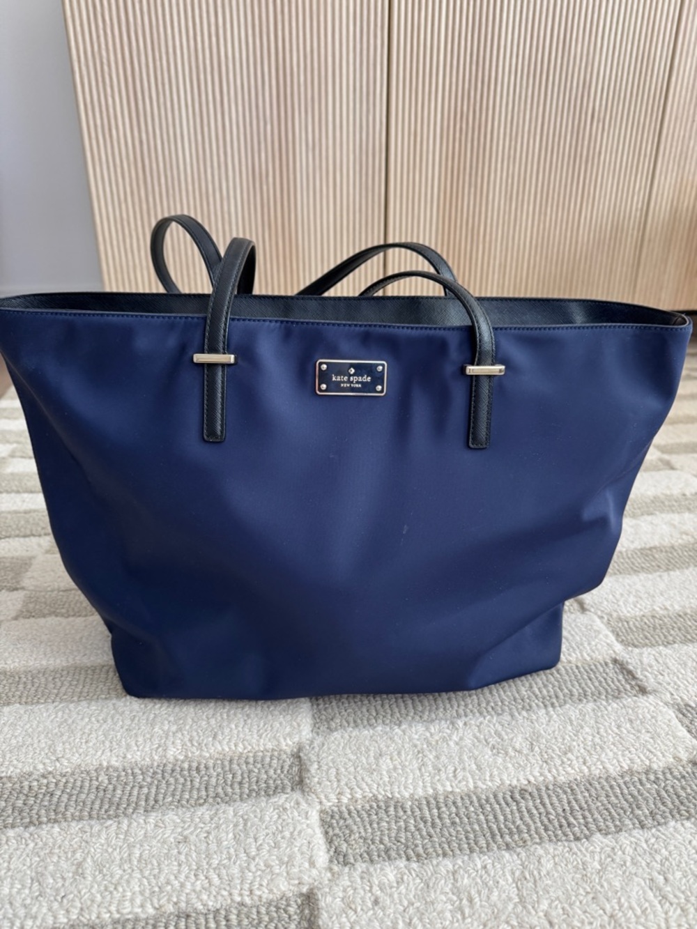 kate spade navy tote with black handles